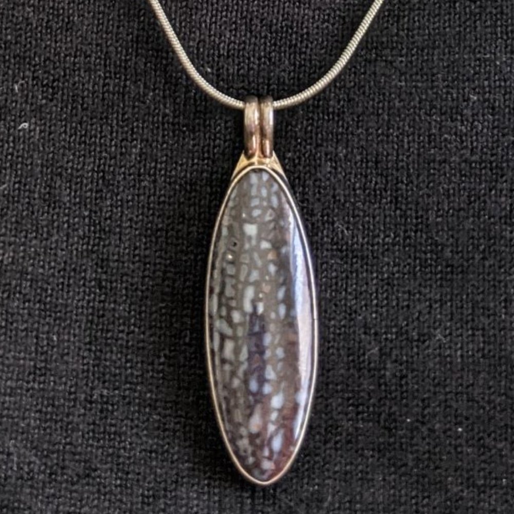 Fossilized Blue Dinosaur Bone Pendant Necklace